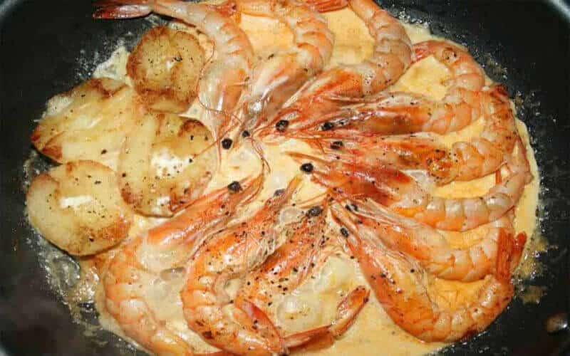 Gambas à la normande flambées au Calvados